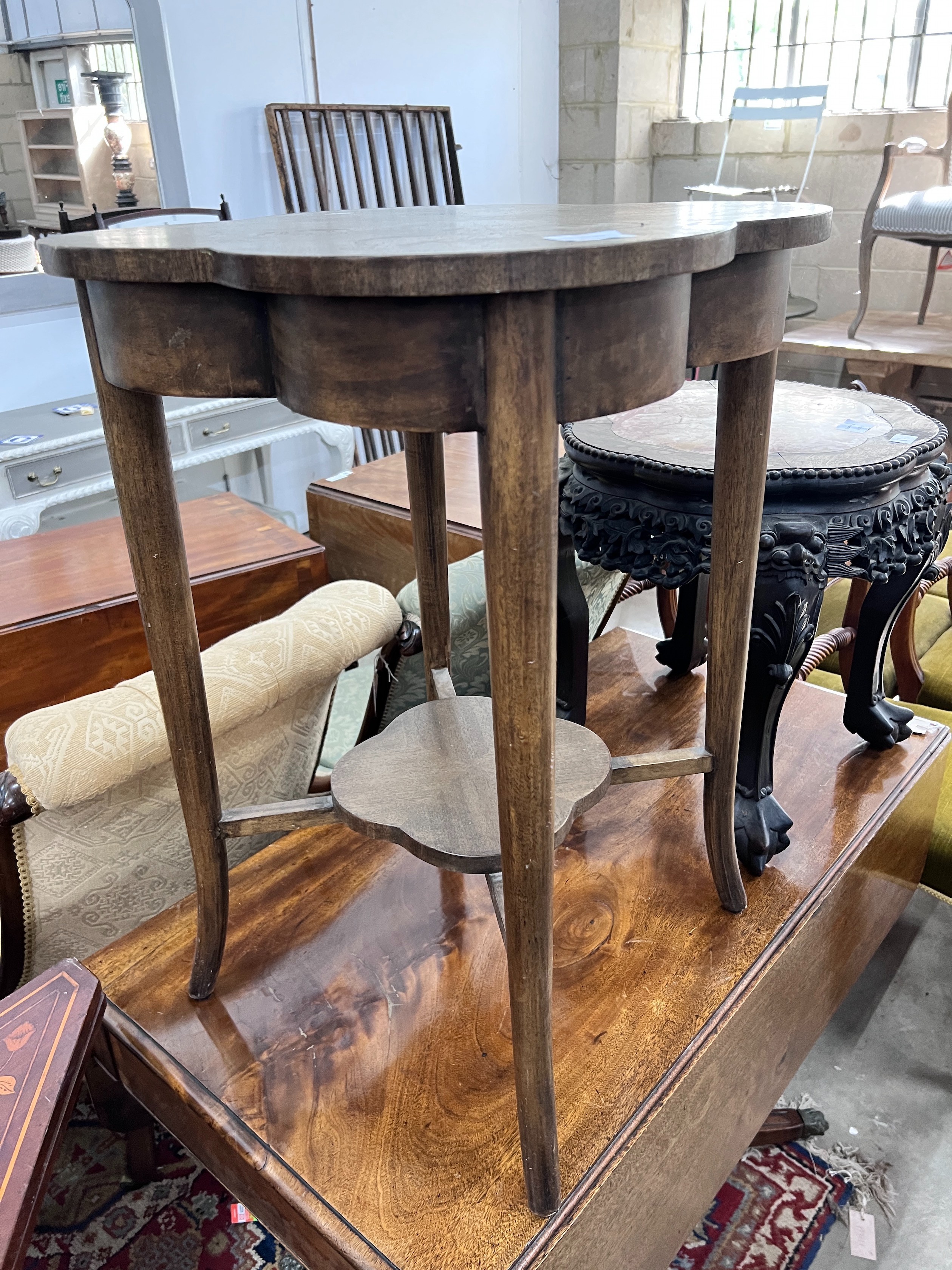 An Edwardian mahogany occasional table, clover-from top, width 55cm, height 70cm *Please note the sale commences at 9am.